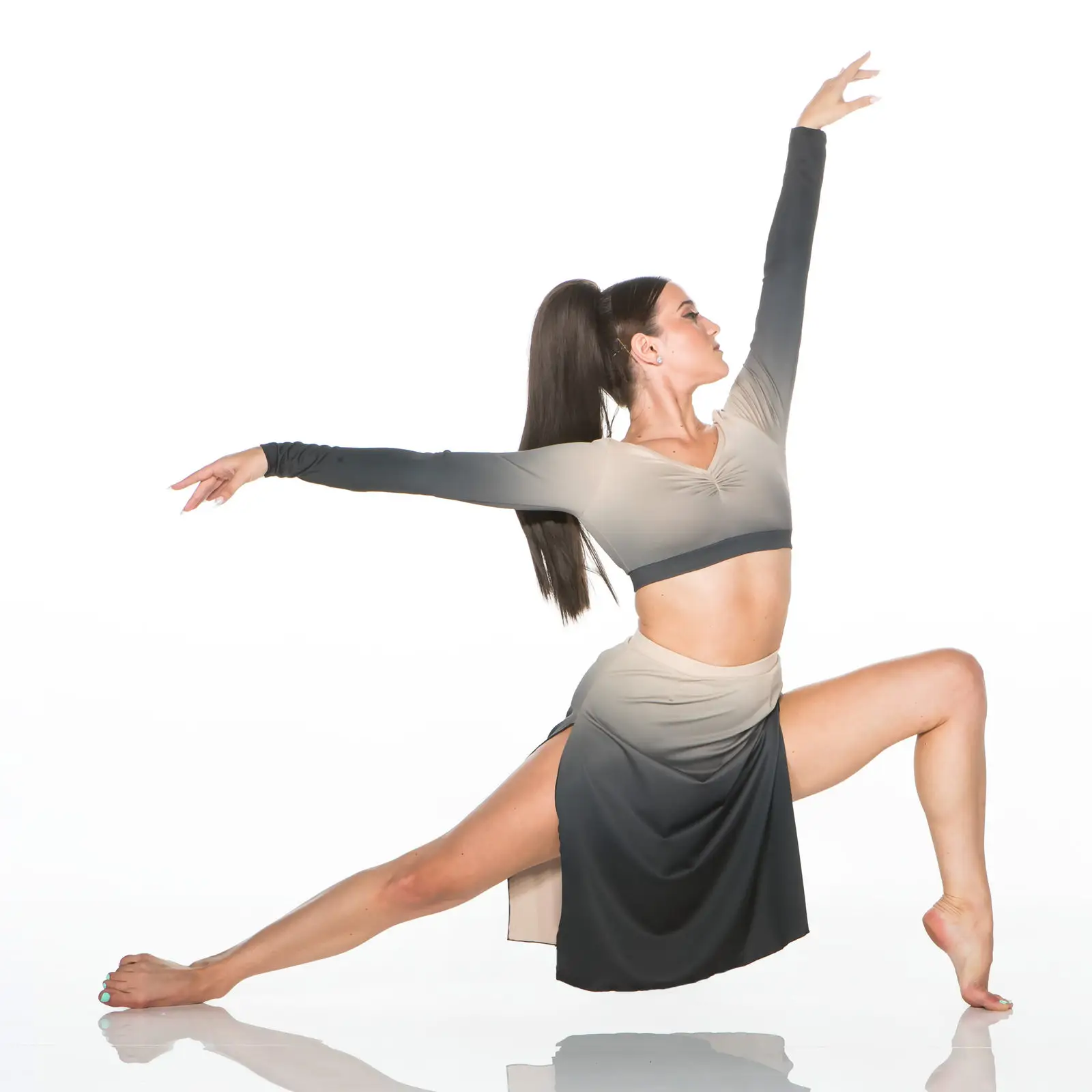 Female dancer posing gracefully in a contemporary dance costume