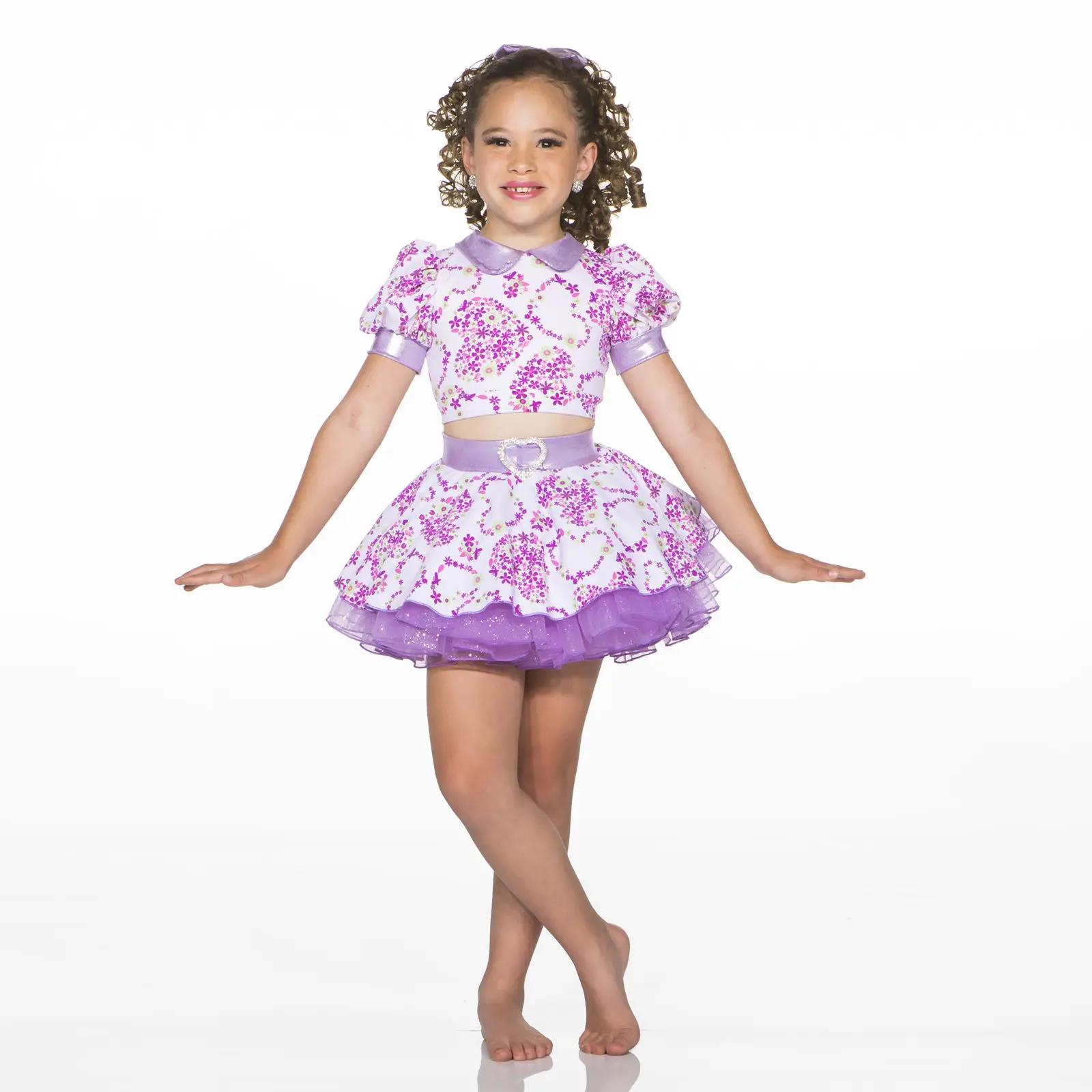 Smiling girl wearing purple floral dance costume